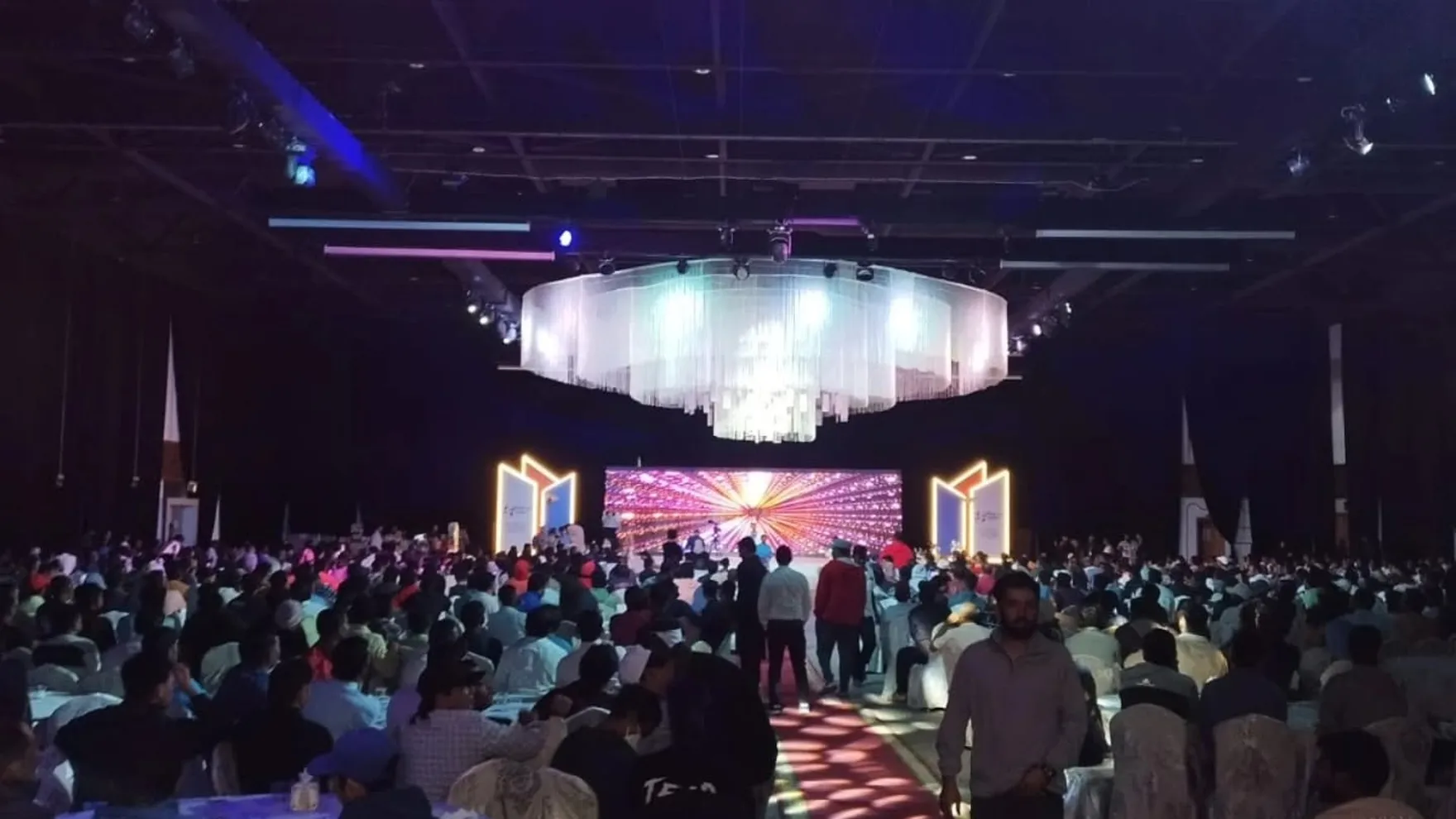 A corporate annual party in a full ballroom