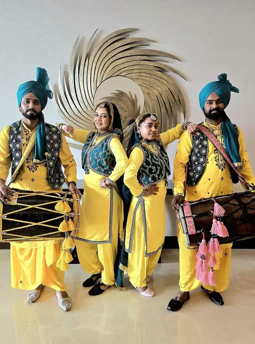 Dhol and bhangra troupe in costume
