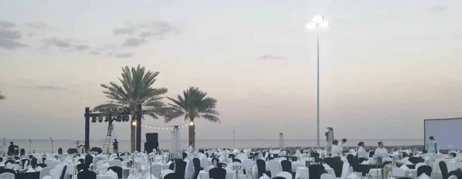 A large outdoor event at dusk